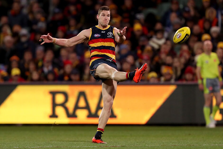 AFL 2018 Round 22 - Adelaide v North Melbourne ADELAIDE, AUSTRALIA - AUGUST 19: Josh Jenkins of the Crows kicks a goal during the 2018 AFL round 22 match between the Adelaide Crows and the North Melbourne Kangaroos at Adelaide Oval on August 19, 2018 in Adelaide, Australia. (Photo by James Elsby/AFL Media)